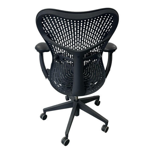 Charcoal mesh Herman Miller Mirra 2 chair from the back.