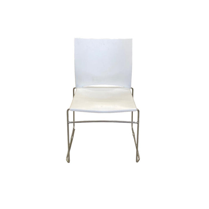 White Xpresso stacking chair with metal legs, from the front.