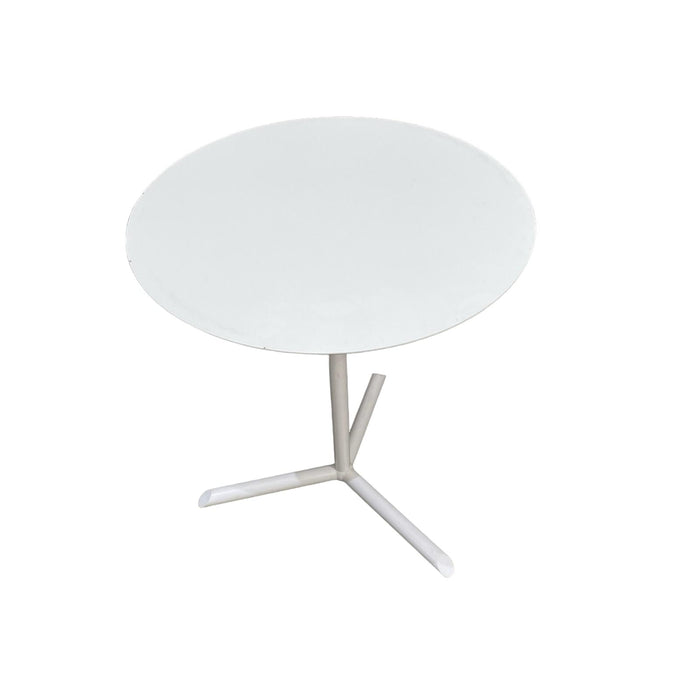 Round white small table with 3 star base.