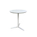 Round white small table with 3 star base.