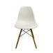 White Vitra DSW eames chair with wooden legs.