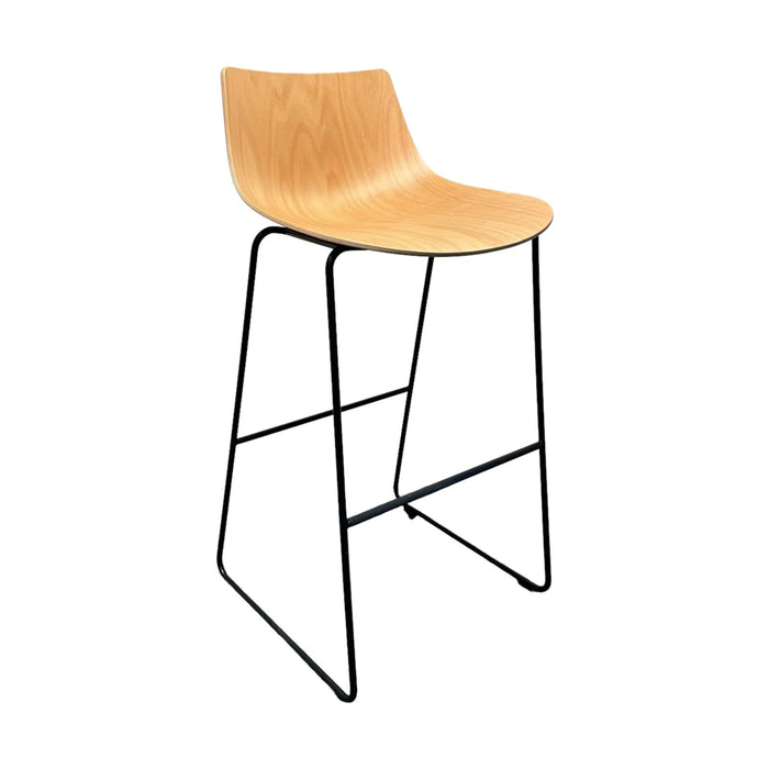Allermuir wooden bar stool with slightly curved shell and black metal legs, from the side.